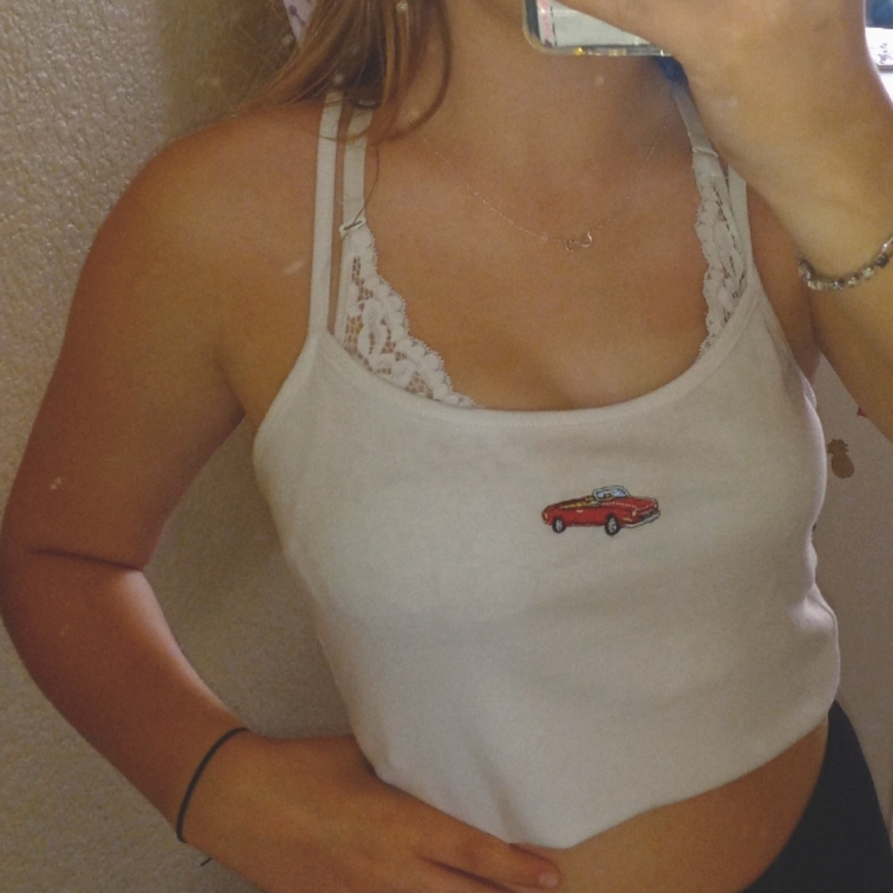 white cropped tank top w/ embroidered red car.